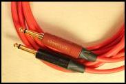 SILENT GUITAR CABLE
POPLESS STRAIGHTY One Straight Gold, one SILENT Straight  gold  NEUTRIK X Jacks with Red CANARE GS6 Cable. Allows silent unplugging. Guitar and Instrument cable.
